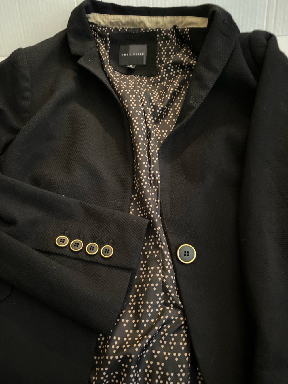 The Limited Black jacket with Gold-Trim Buttons